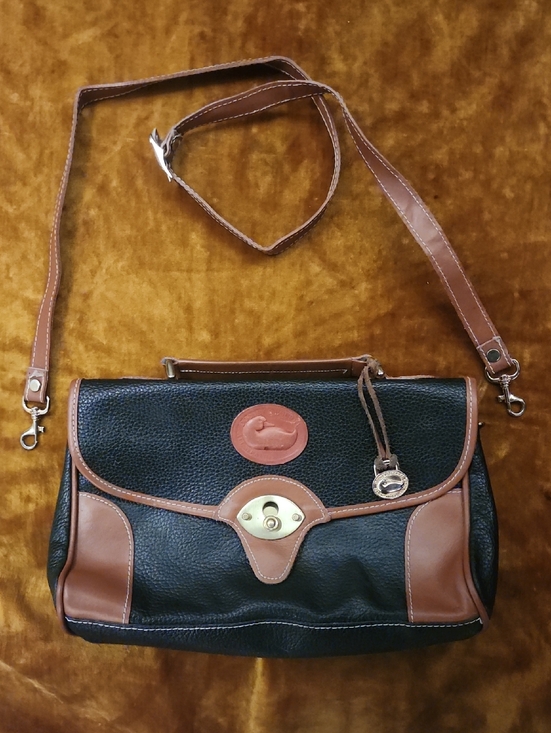 Dooney & Bourke Handbags - 🤩SALE🤩 Vintage Black and Tan Dooney & Bourke Leather Satchel W/ Medallion